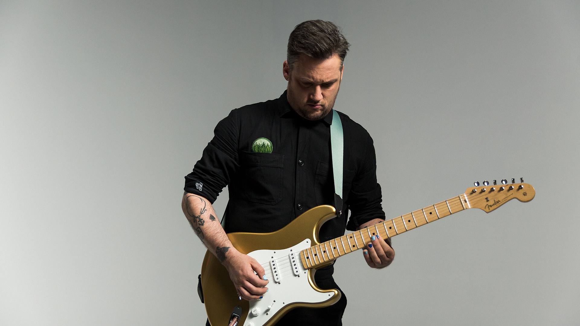 Fender artist playing guitar